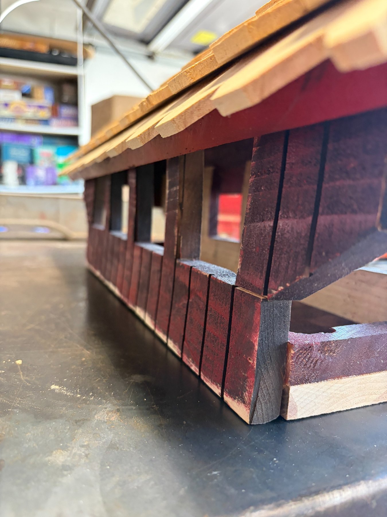 Side view of covered bridge bird feeder